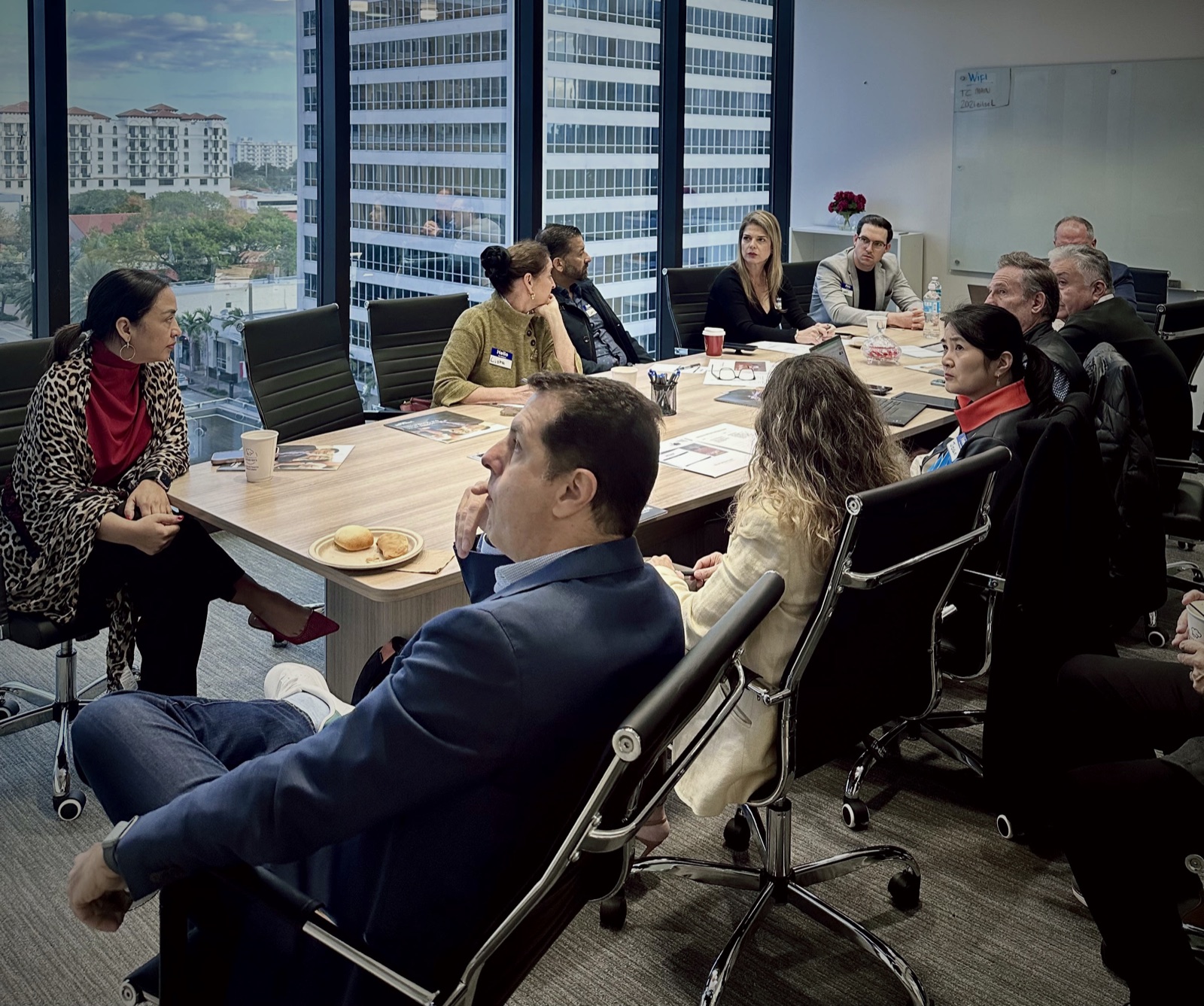 Founders in conversation around the table at a 305Founders breakfast in Miami