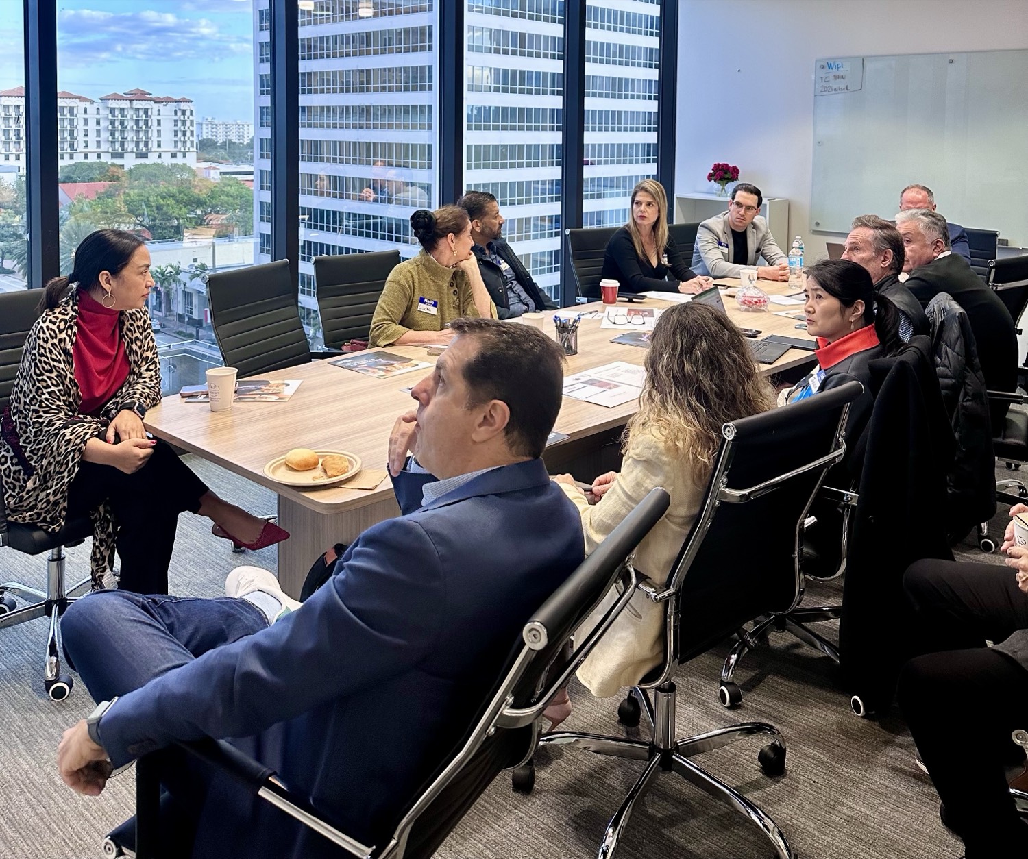 Founders in conversation around the table at a 305Founders breakfast in Miami